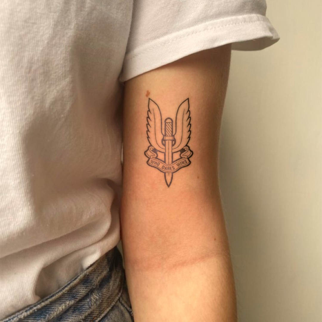 Who dares wins Tattoo on arm