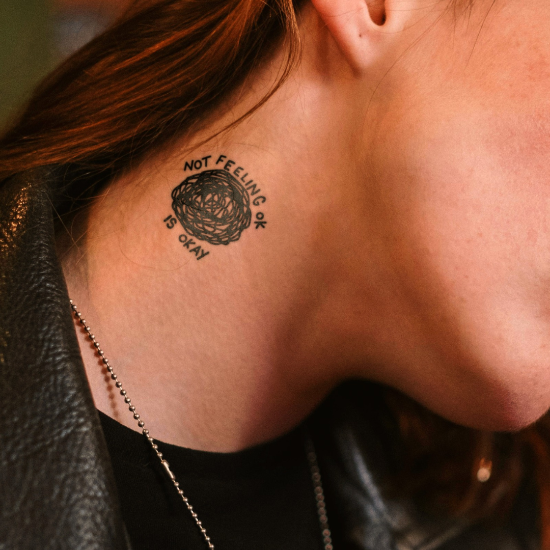 Inner Turmoil Tattoo on neck