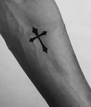 Sharp-Cross semi permanent tattoo