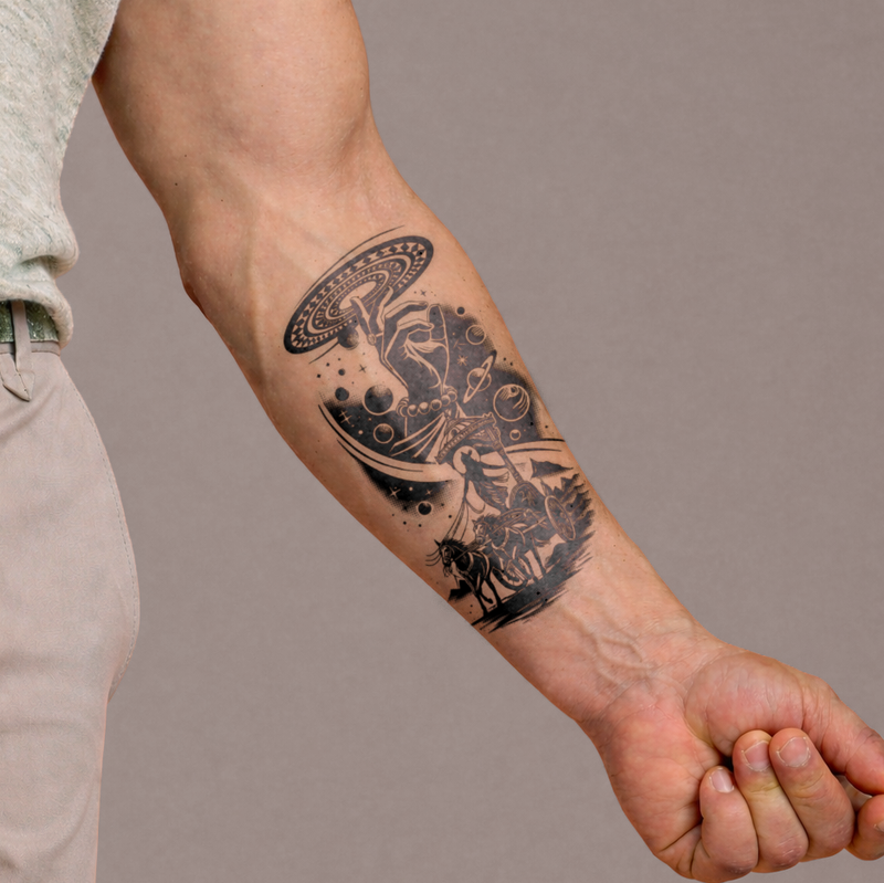 Tattoo on a person's forearm against a neutral background