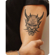 Sinister Mask Tattoo