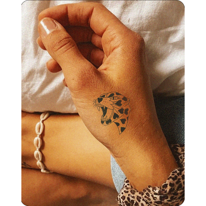 Heart Spotted Fury Tattoo