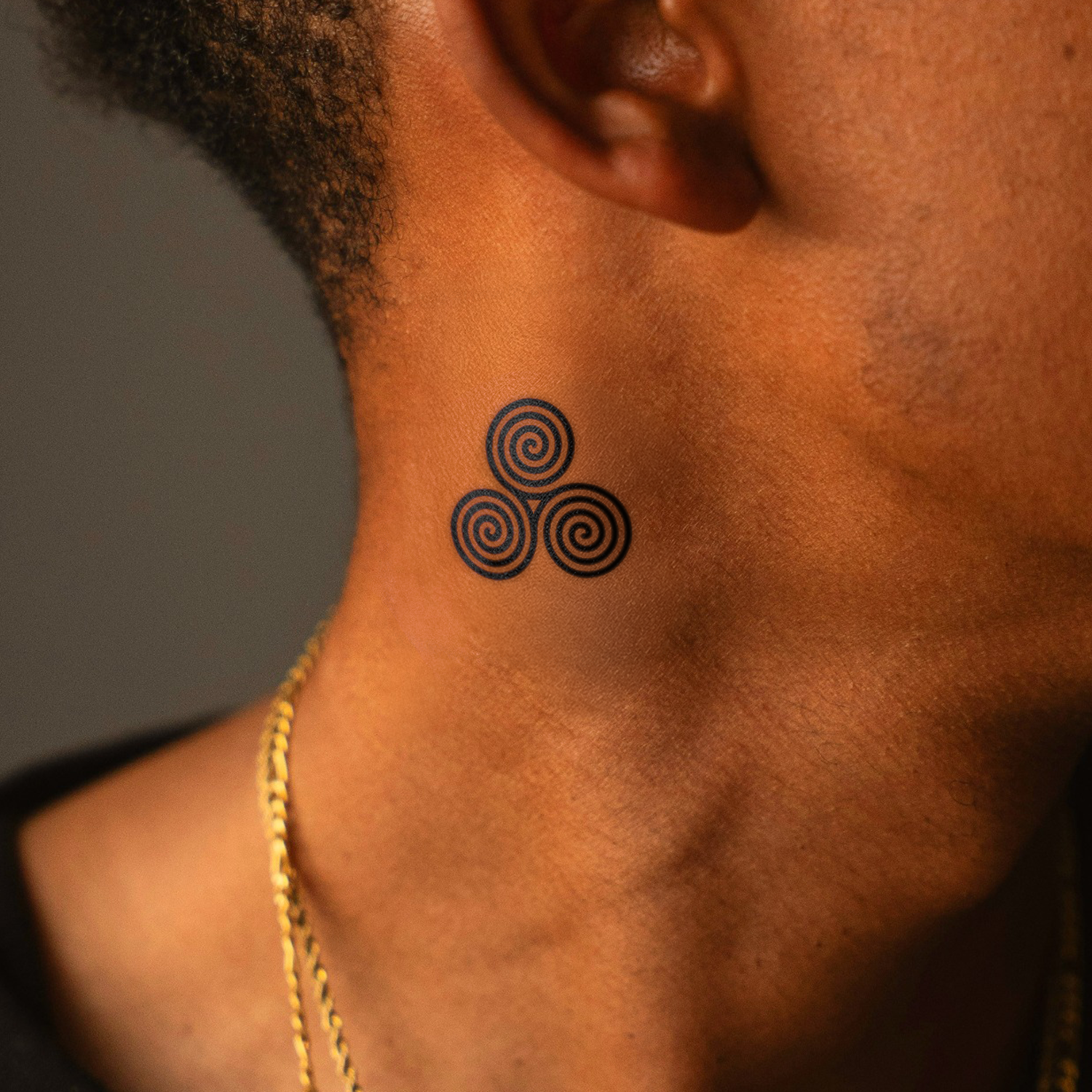 Triple Spiral Tattoo