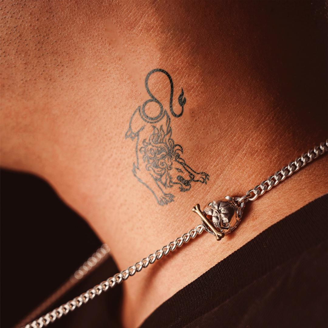 Leo legacy tattoo on neck