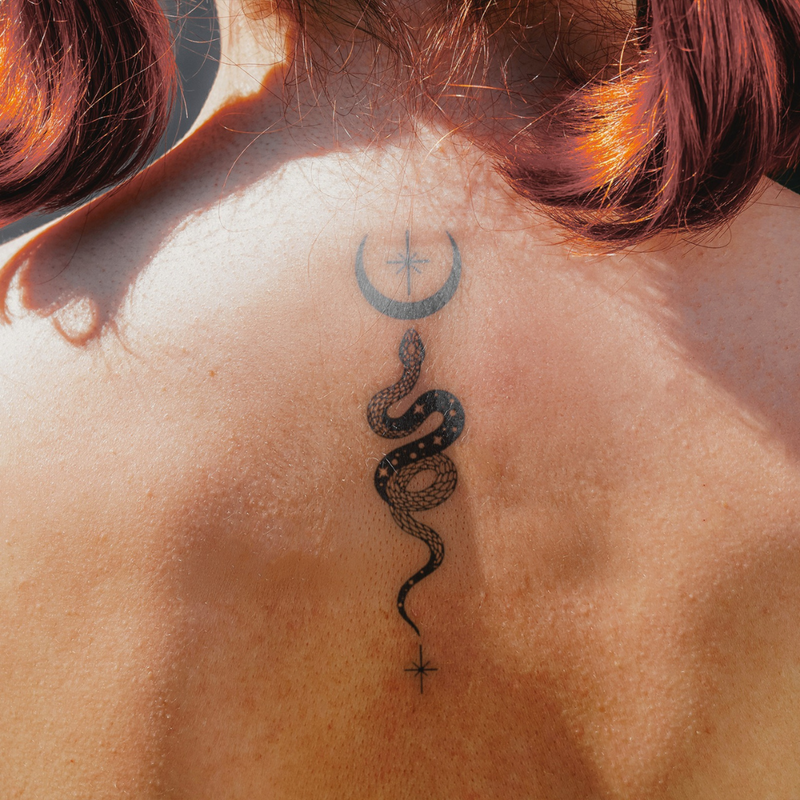 Moonlit Serpent Tattoo on back 