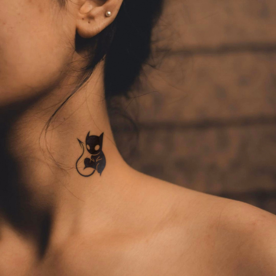 Naughty Demon Tattoo on neck 
