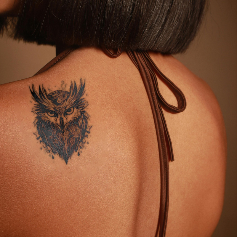 Night's Wisdom Tattoo on back