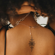 Daisy Essence Tattoo on back