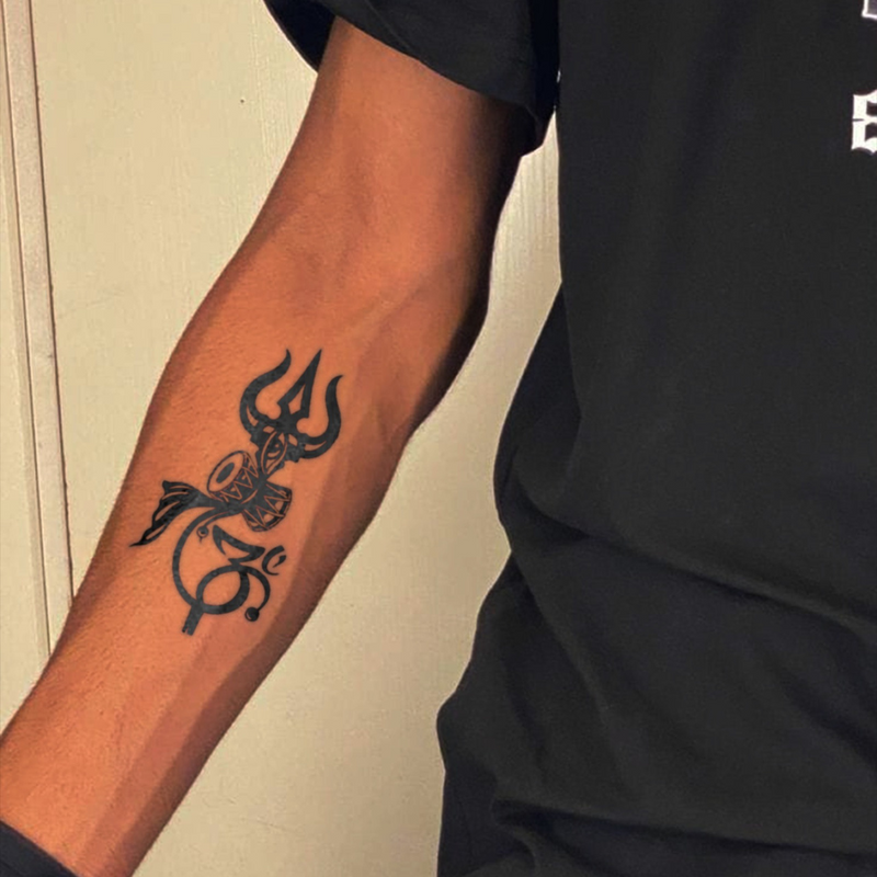 Divine Trishul Tattoo on arm