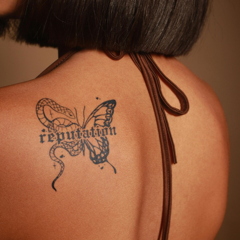 Reputation Tattoo on back