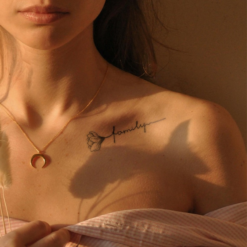 Wings of charges Tattoo on collar bone