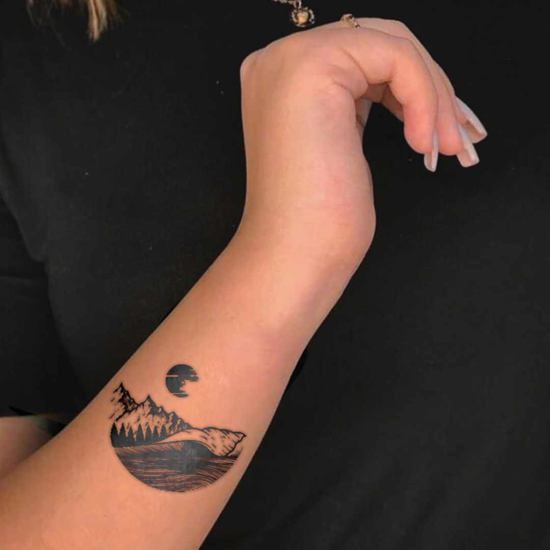 Waves and Peaks Tattoo on arm