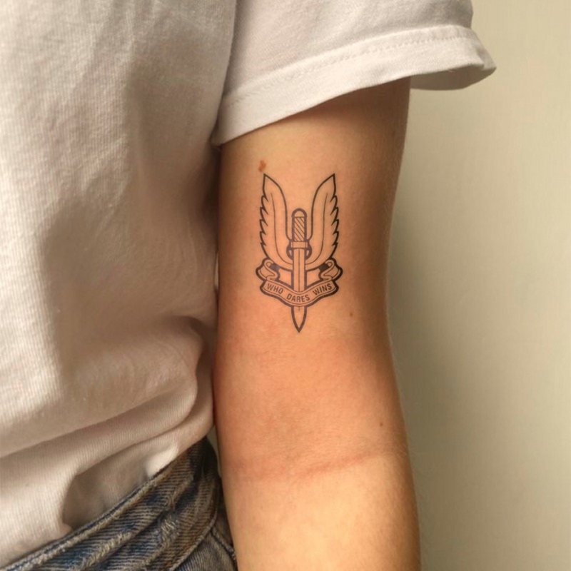 Who dares wins Tattoo on arm