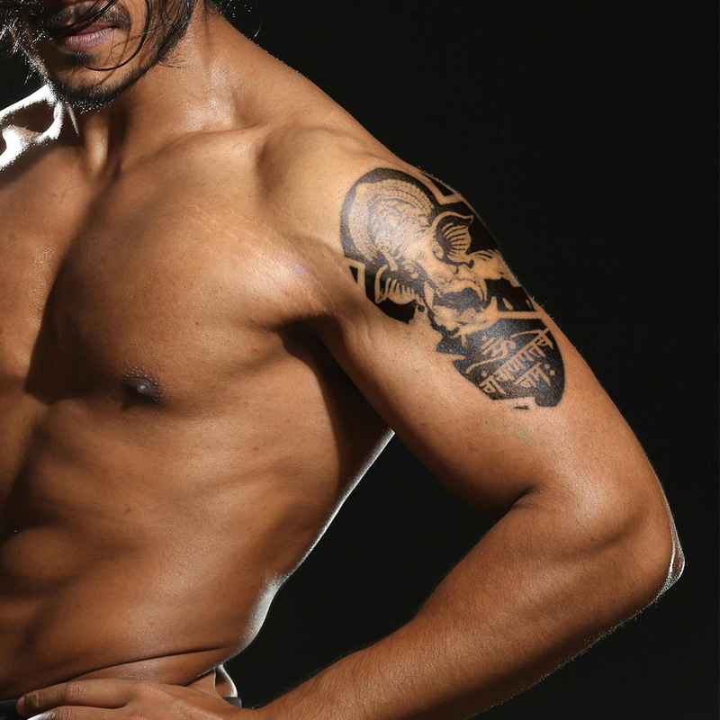 Vighnaharta Tattoo on shoulder