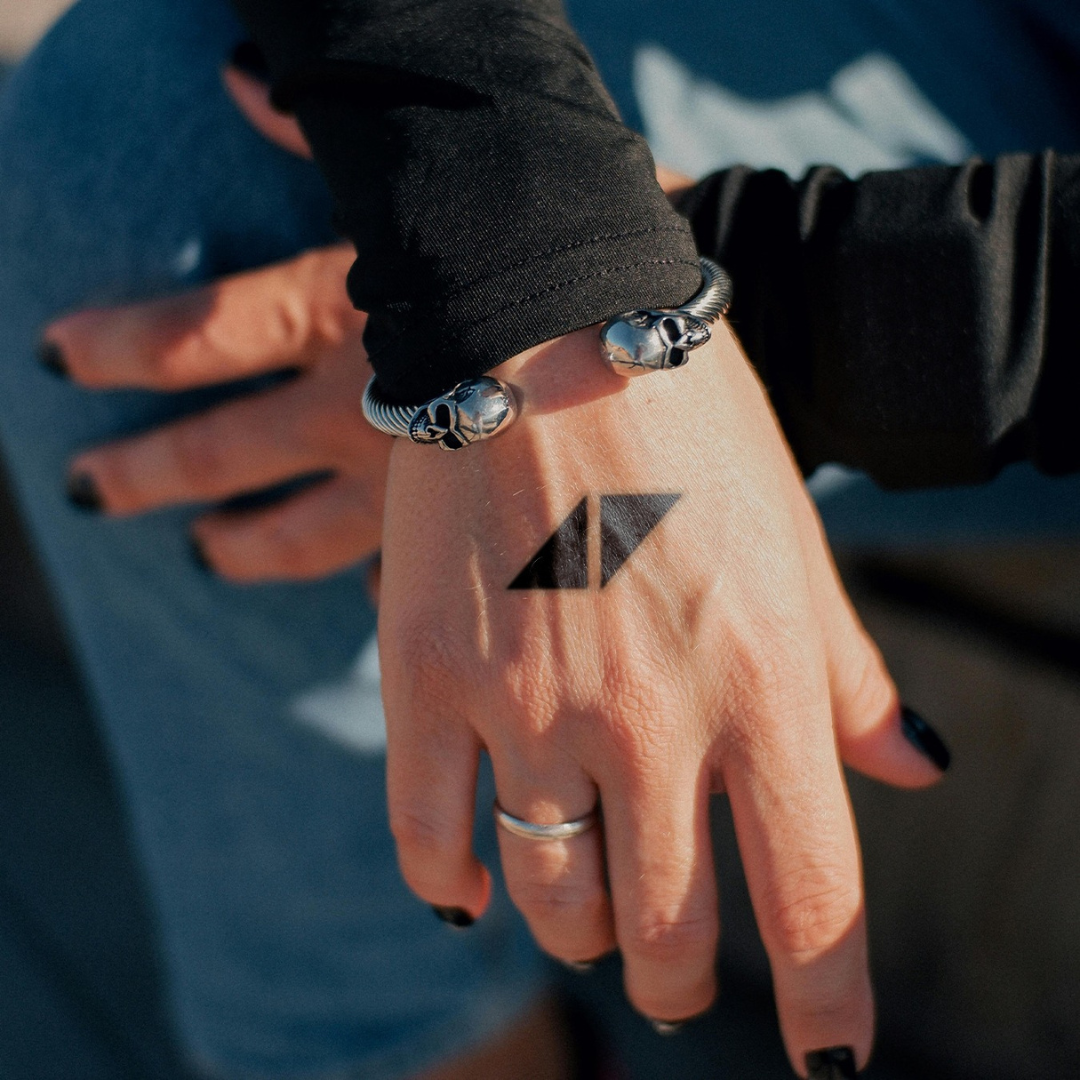 Twin Paradox Tattoo on hand 