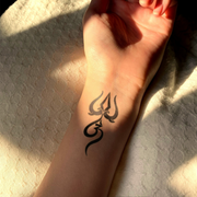 Trimurti Talisman Tattoo on wrist 