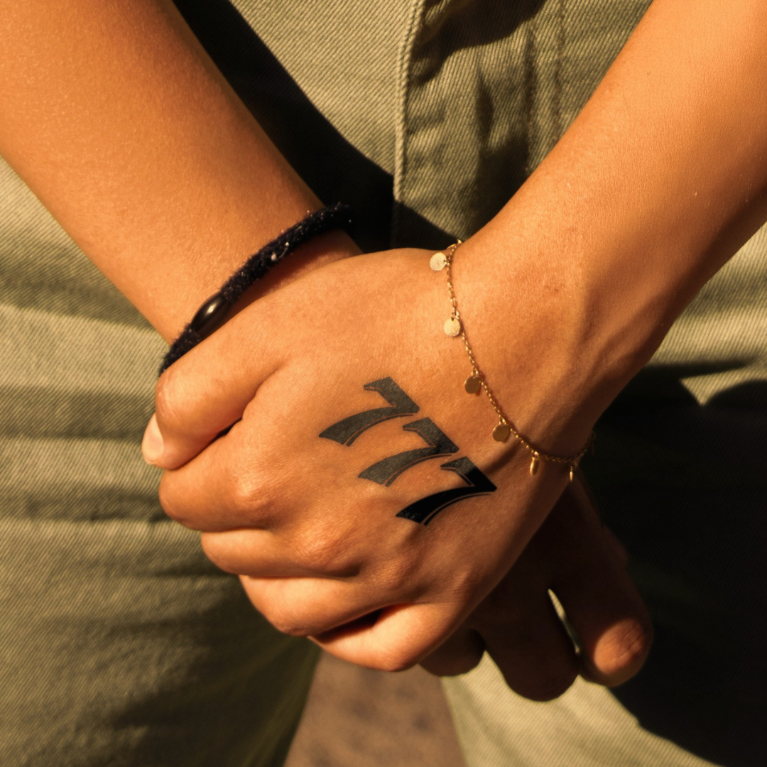 Lucky Sevens Tattoo on hand