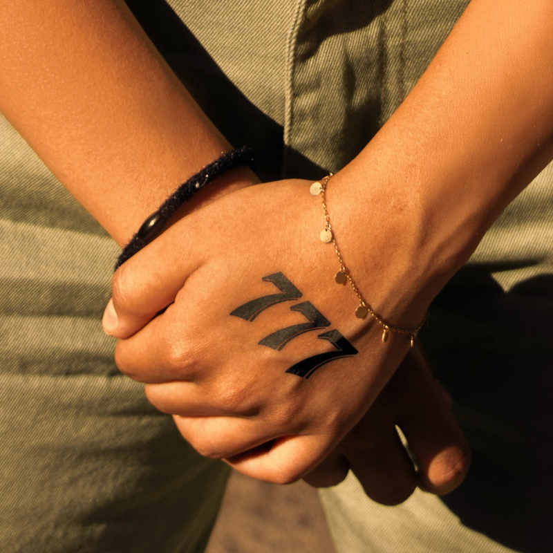 Lucky Sevens Tattoo on hand