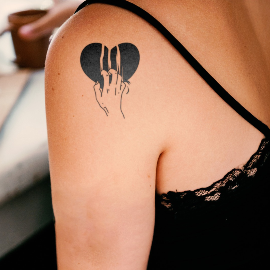 Painful Heart tattoo on shoulder