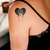 Painful Heart tattoo on shoulder