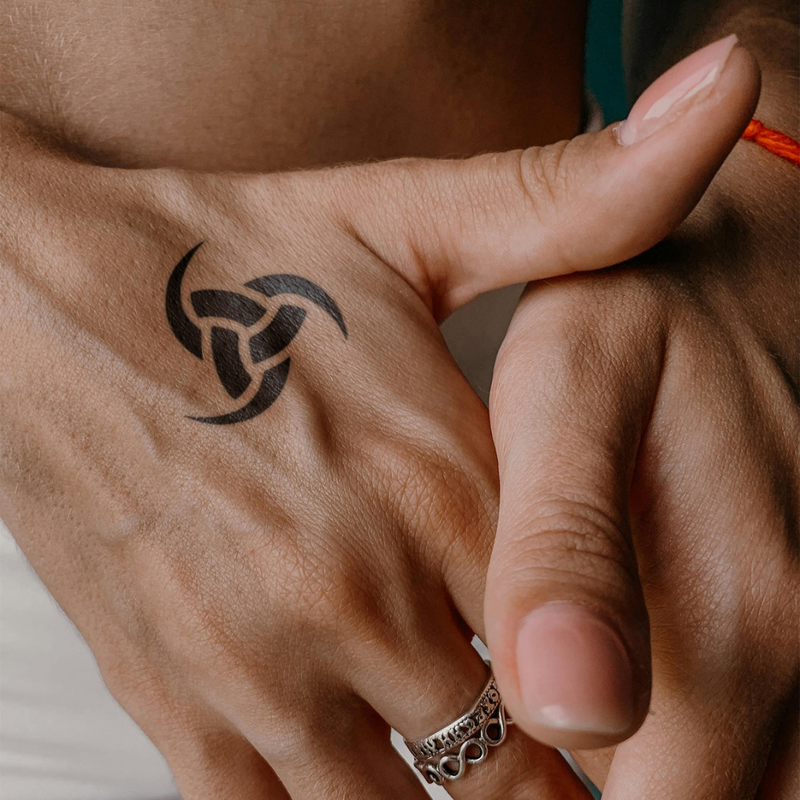 Radiation Tattoo on hand 