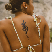 Cunning Steel Tattoo on back