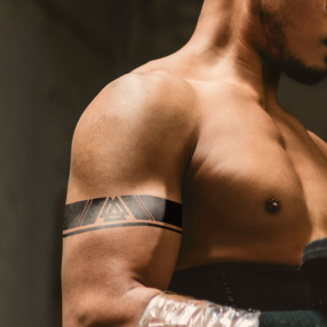 KALKI Triangle Tattoo on bicep