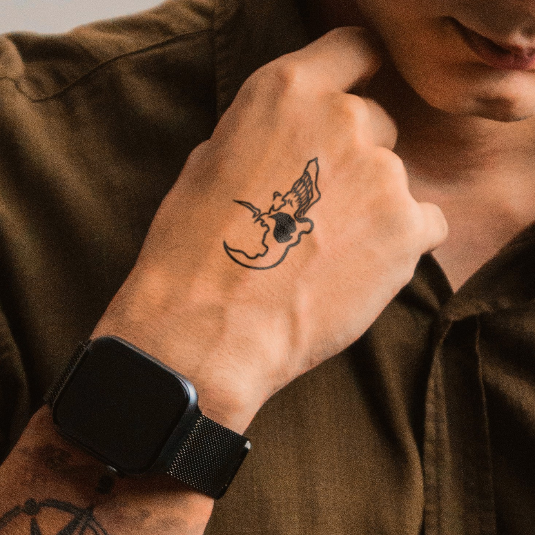 Beyond Death Tattoo on hand