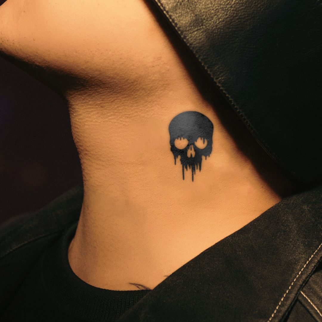 Bleeding Skull tattoo on neck 