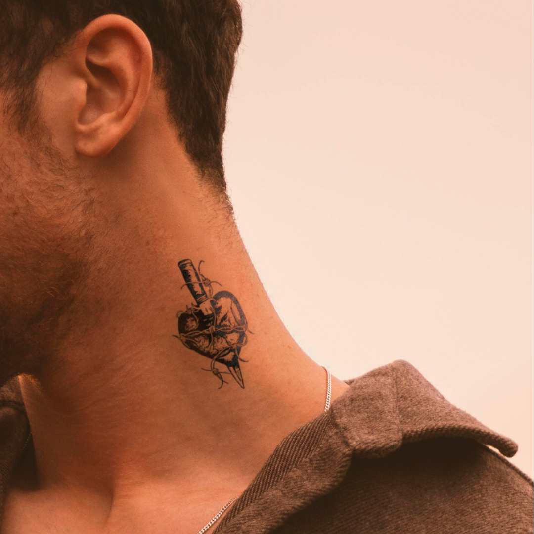 Heart’s Sacrifice Tattoo on neck