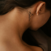Humming Bird Tattoo on neck 