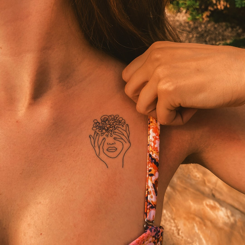 Chaotic Mess Tattoo on chest