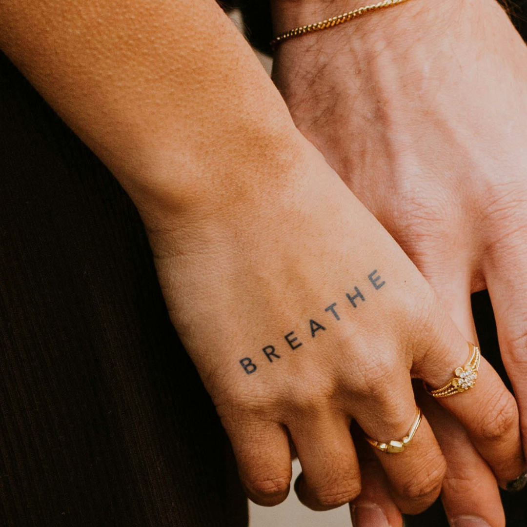 Breathe Tattoo on hand 