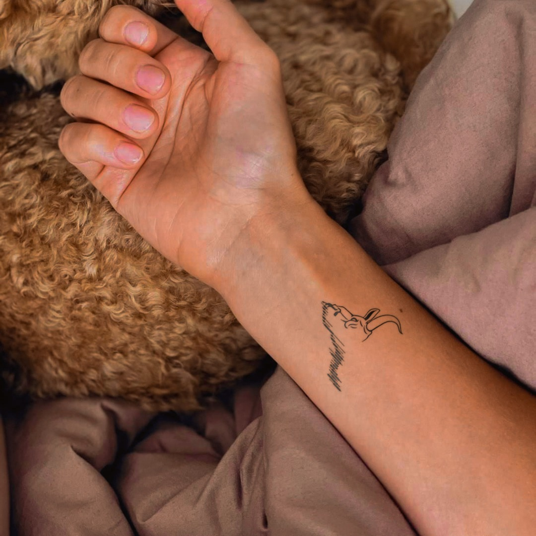 Bullish Ascent Tattoo on wrist
