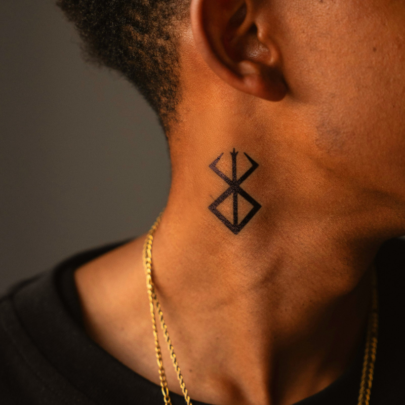 Berserk Symbol of Sacrifice Tattoo on neck 