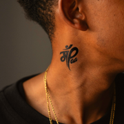 Maa Paa Tattoo on neck 