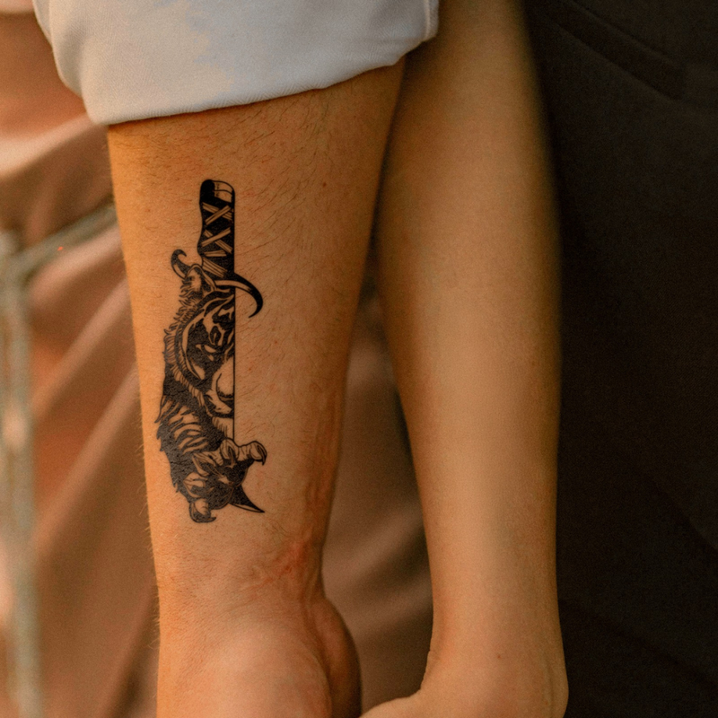 Beast Blade Tattoo on arm